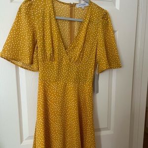 Cute summer dress or yellow with white polkadots